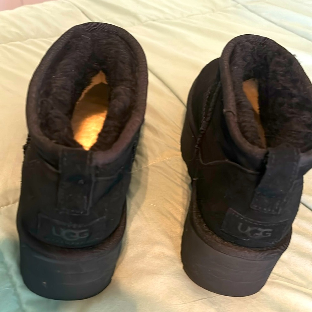 These gorgeous ankle black UGG boots have never been worn.